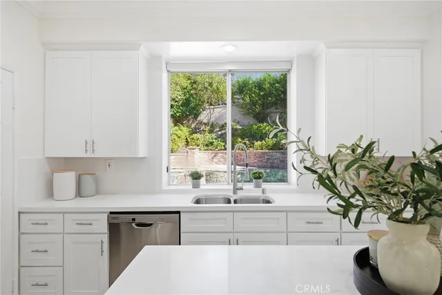 a view of a swimming pool with a yard