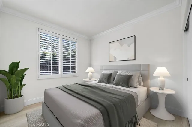 a view of balcony with wooden floor and fence