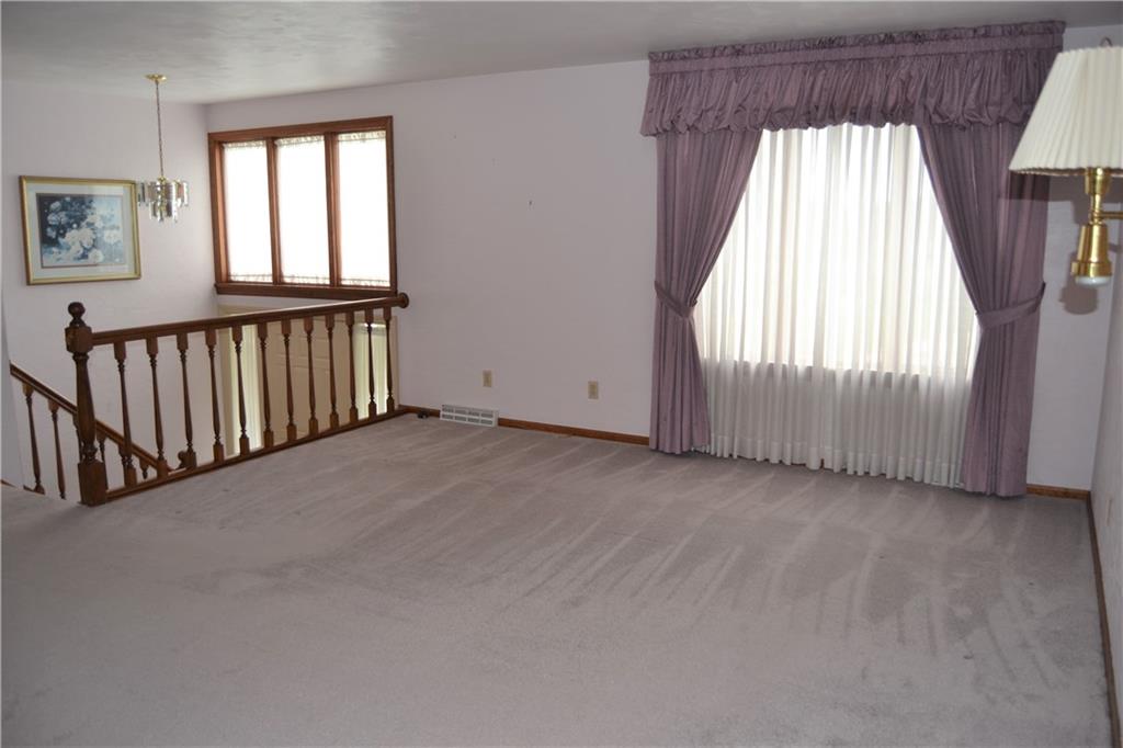 1091 5 Pines Road North Huntingdon, PA 15642 - Photo 2 of 20 Living room opens to dining room, immaculate - move-in-ready!