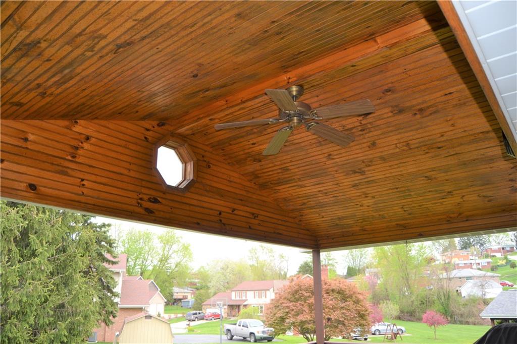1091 5 Pines Road North Huntingdon, PA 15642 - Photo 16 of 20 Covered deck in rear with ceiling fan and attached grill