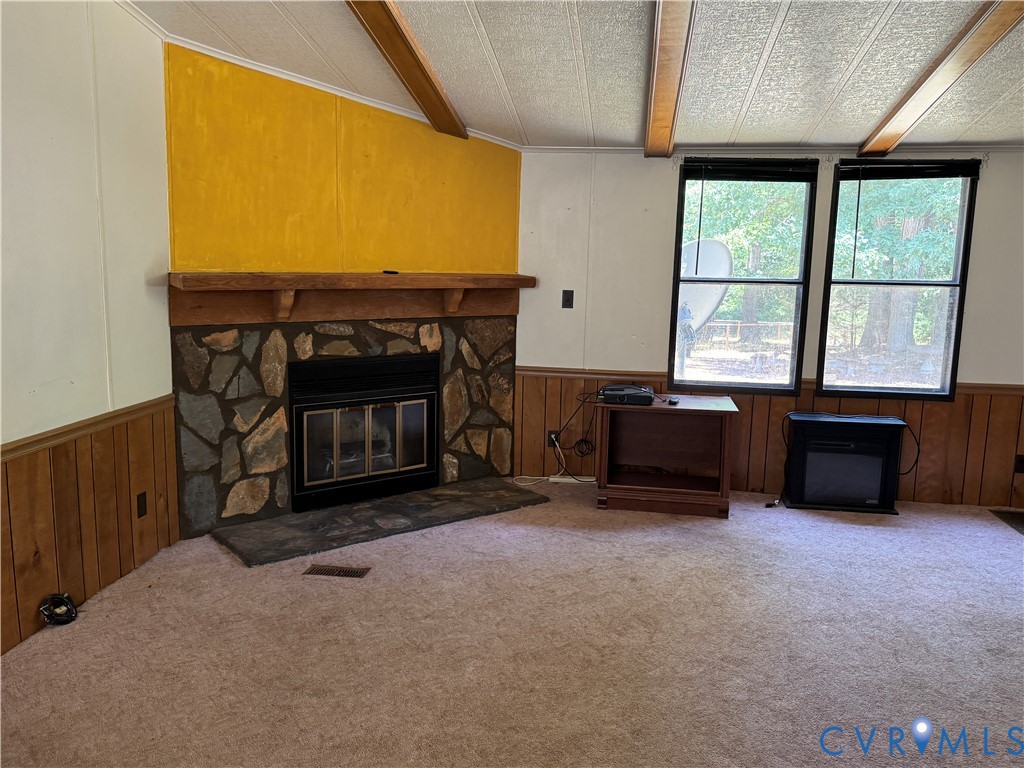 371 Horseshoe Road Jarratt, VA 23867 - Photo 13 of 21 a living room with furniture and a fireplace