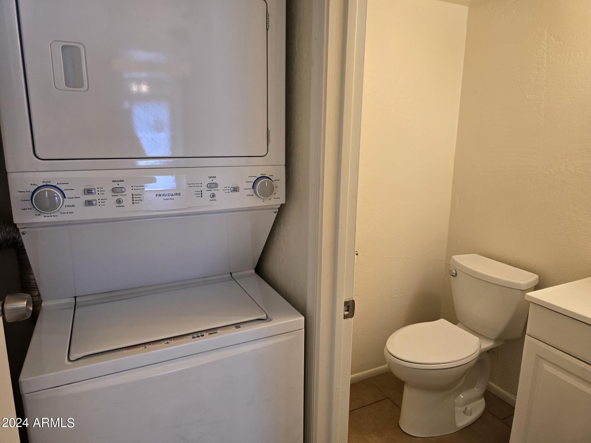 4747 North 14th Street, Unit J Phoenix, AZ 85014 - Photo 14 of 25 laundry in bathroom