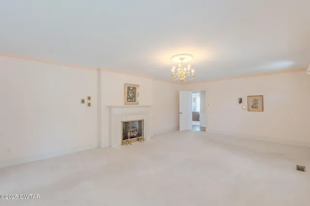 a spacious bathroom with a large tub and shower