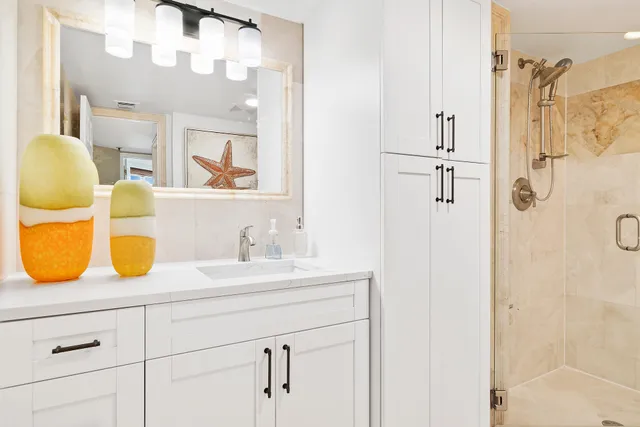 a bathroom with a shower and toilet