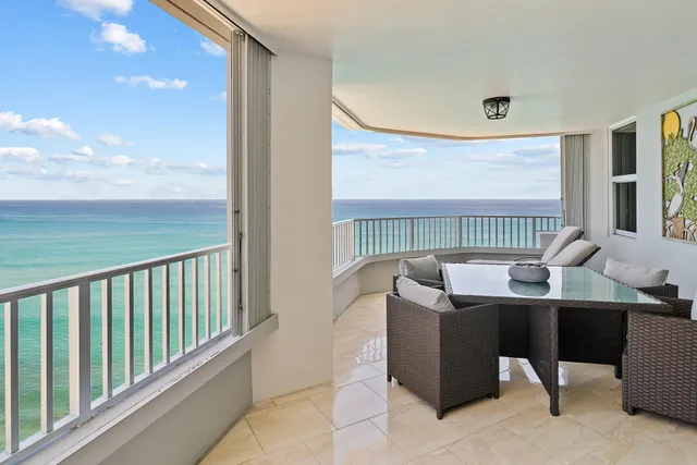 a view of an ocean from a balcony