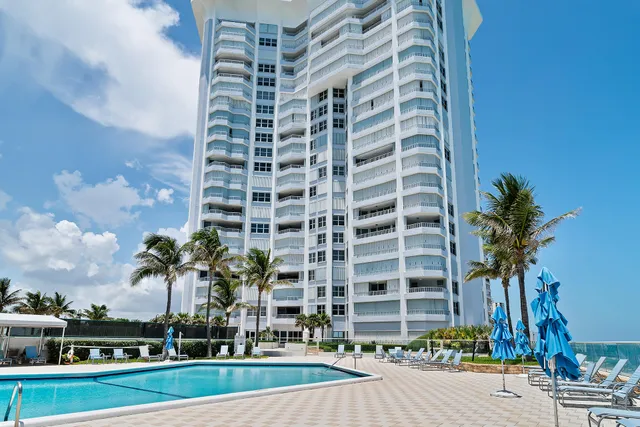 a view of a dining room with furniture and window