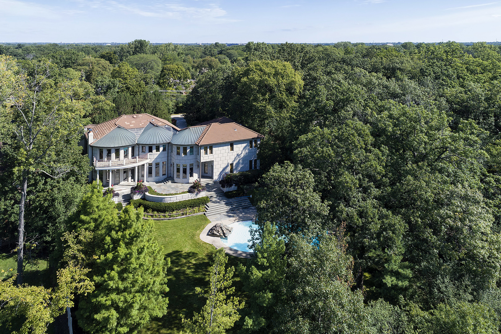 1115 Voltz Road Northbrook, IL 60062 - Photo 23 of 28 a view of a house with swimming pool and a chairs