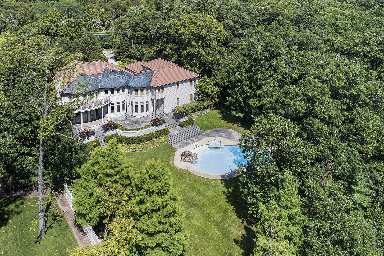 1115 Voltz Road Northbrook, IL 60062 - Photo 28 of 28 an aerial view of a house with swimming pool and garden