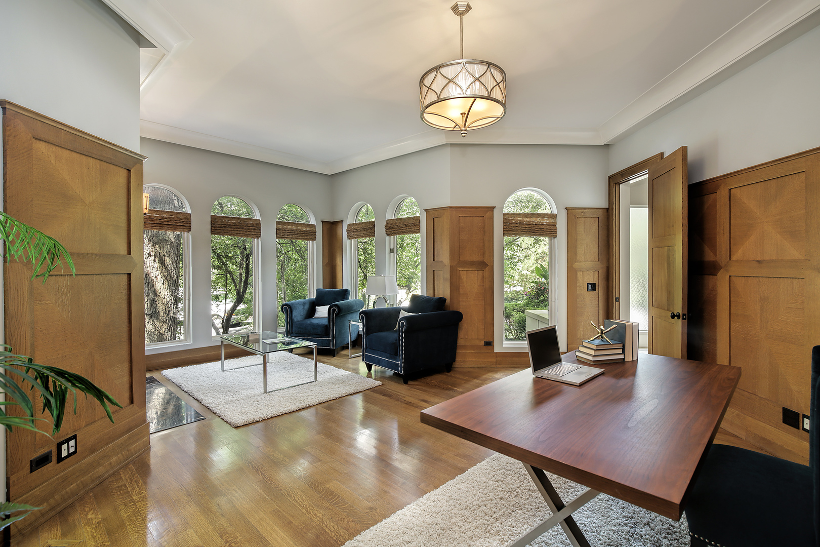 1115 Voltz Road Northbrook, IL 60062 - Photo 7 of 28 a living room with fireplace furniture and a large window