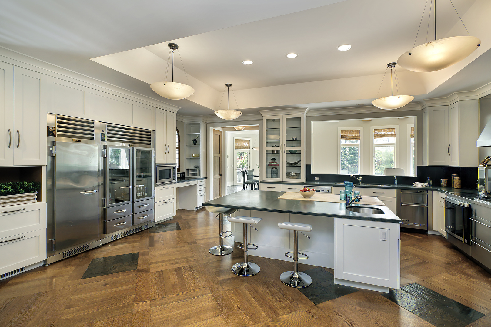 1115 Voltz Road Northbrook, IL 60062 - Photo 8 of 28 a kitchen with a sink stainless steel appliances and cabinets