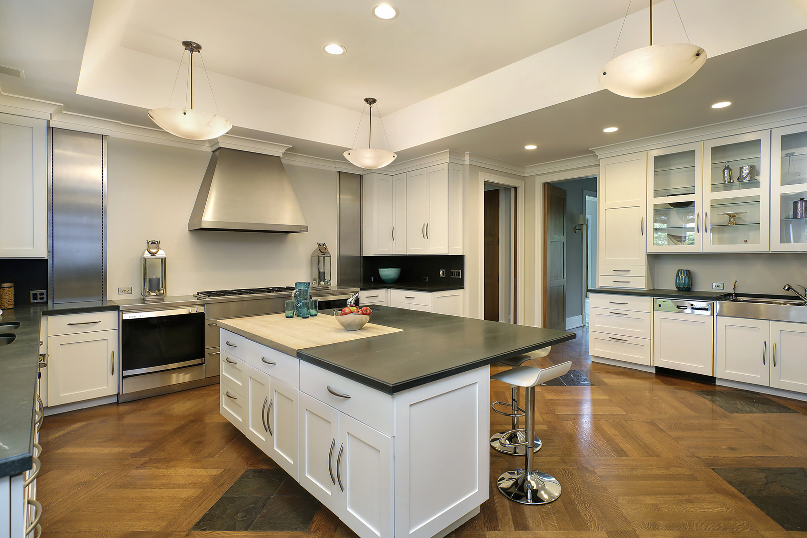 1115 Voltz Road Northbrook, IL 60062 - Photo 10 of 28 a kitchen with stainless steel appliances granite countertop a sink a stove and a refrigerator