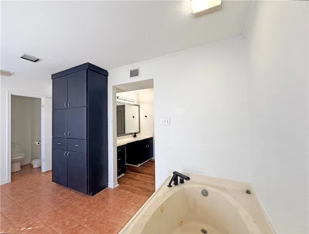 a bathroom with a sink and a tub