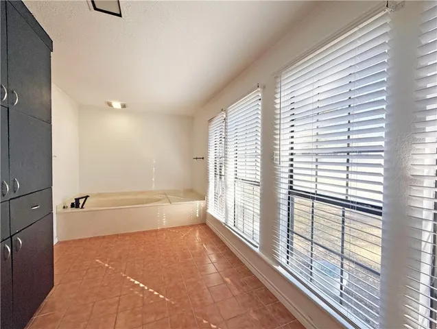 a view of a bathtub in a room