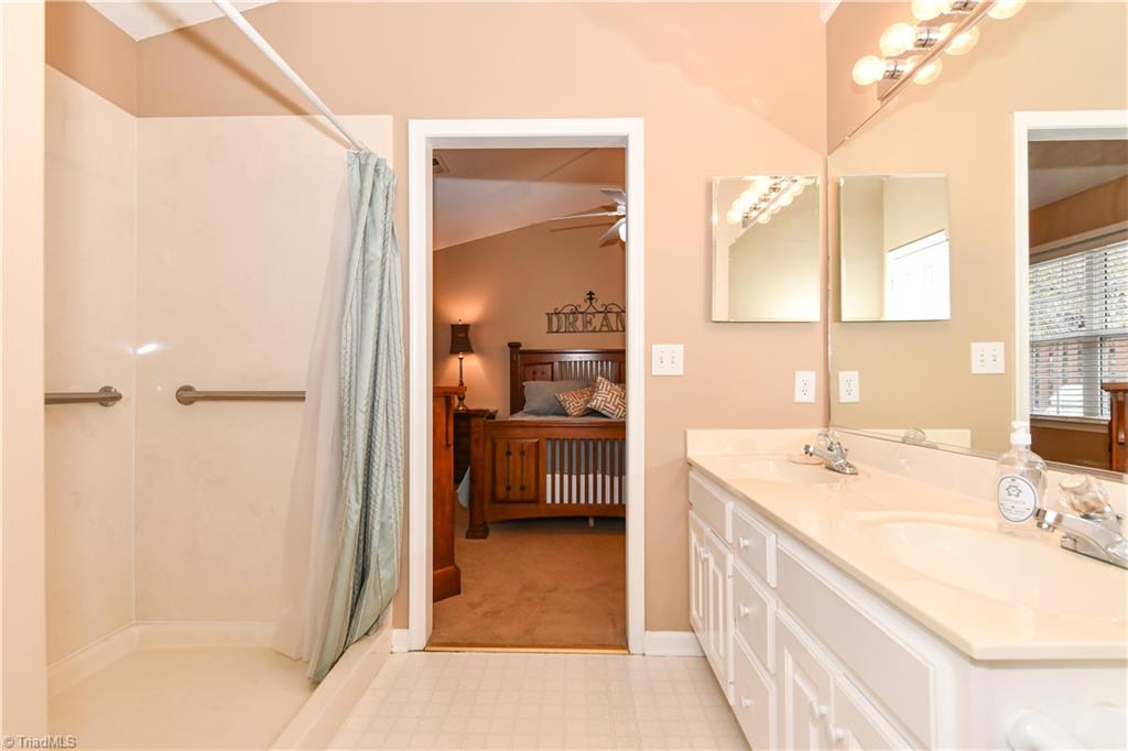 4406 Single Tree Lane High Point, NC 27265 - Photo 15 of 23 Shower has handicap railing