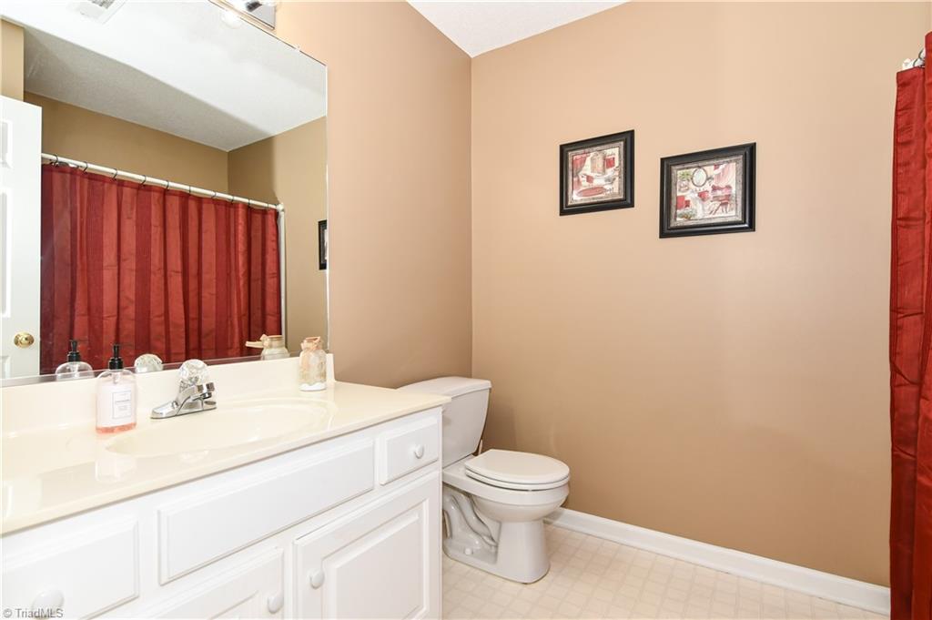 4406 Single Tree Lane High Point, NC 27265 - Photo 18 of 23 Second bathroom with tub and shower