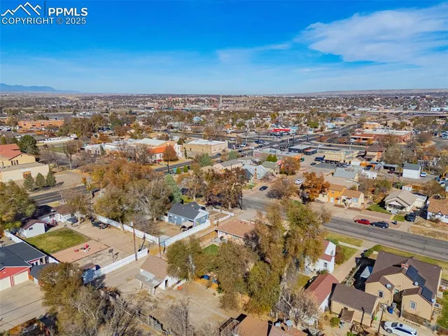 an aerial view of residential building with parking space