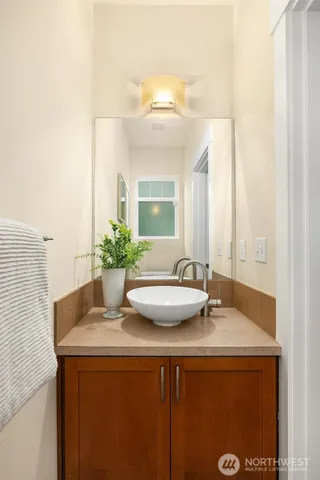 a dining room with table and chairs