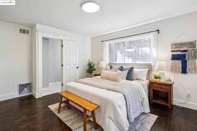a view of a livingroom with a dishwasher and furniture
