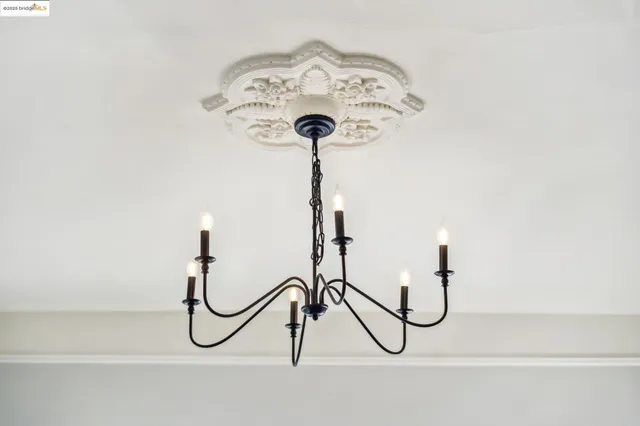 a kitchen that has a lot of cabinets in it and appliances