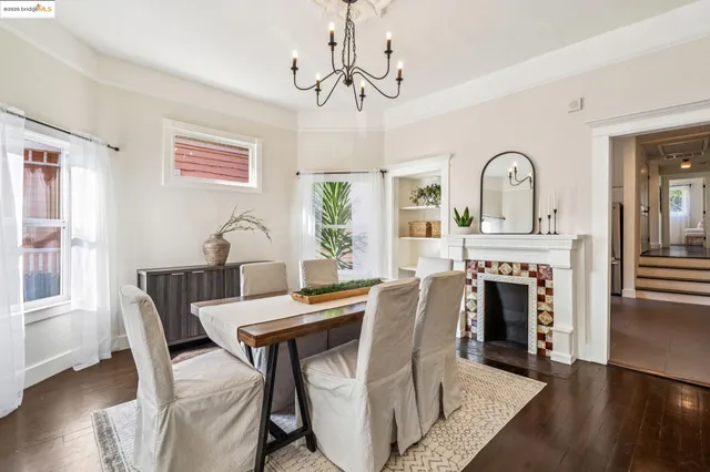 a kitchen with stainless steel appliances a stove a sink and a refrigerator