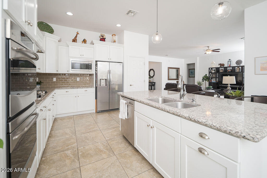 15730 West Harvard Street Goodyear, AZ 85395 - Photo 12 of 40 Granite Counters