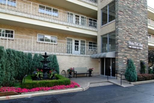 1 North Dee Road, Unit 2B Park Ridge, IL 60068 - Photo 1 of 1 front view of a building with an outdoor space