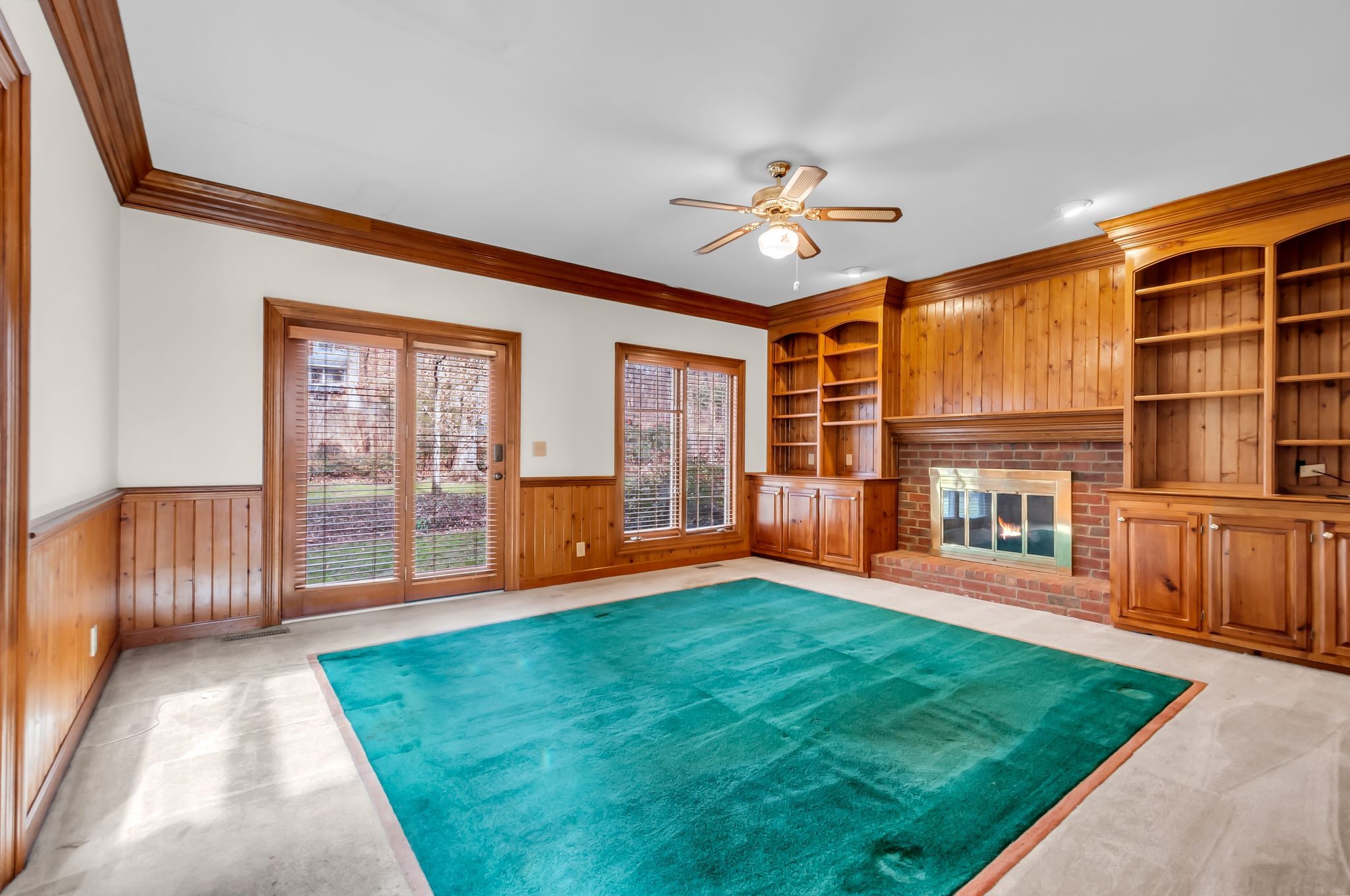 608 Cheshire Circle Franklin, TN 37069 - Photo 13 of 42 a view of an empty room with a window and wooden floor