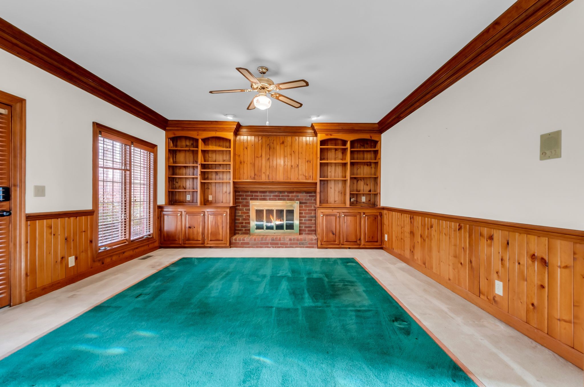 608 Cheshire Circle Franklin, TN 37069 - Photo 14 of 42 a view of an empty room with a window and wooden floor