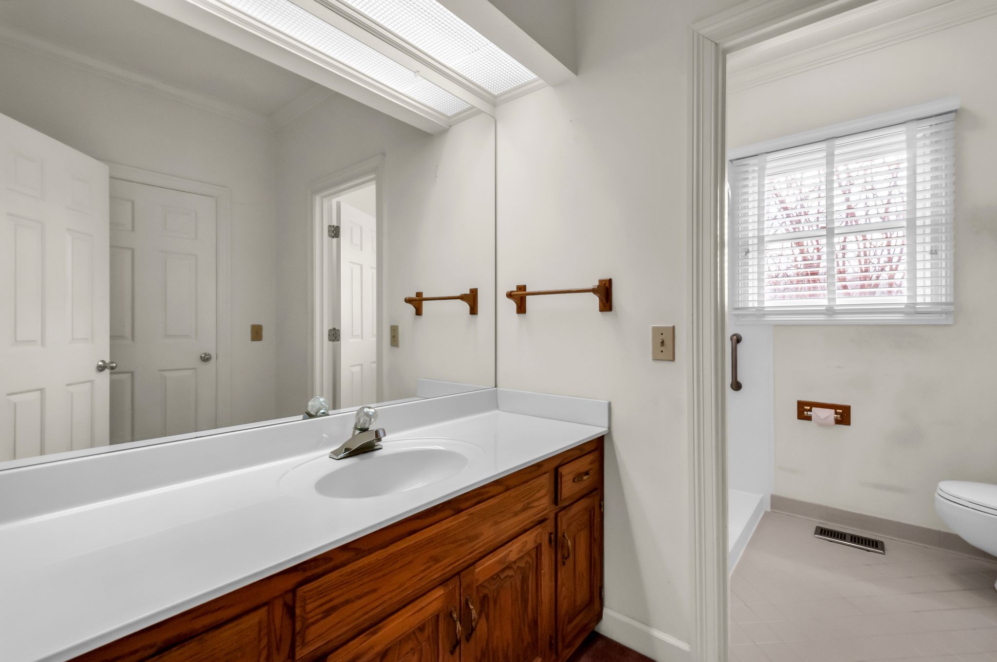 608 Cheshire Circle Franklin, TN 37069 - Photo 20 of 42 a bathroom with a sink and a mirror