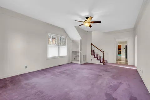 a view of empty room with windows