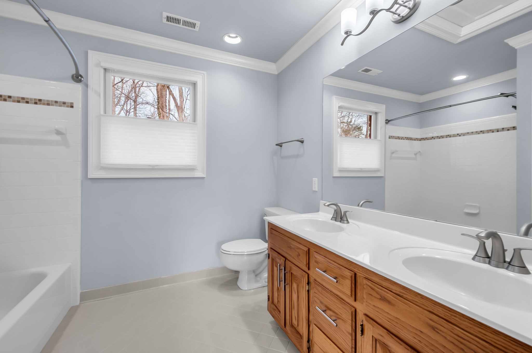 608 Cheshire Circle Franklin, TN 37069 - Photo 27 of 42 a bathroom with a granite countertop sink mirror vanity and toilet