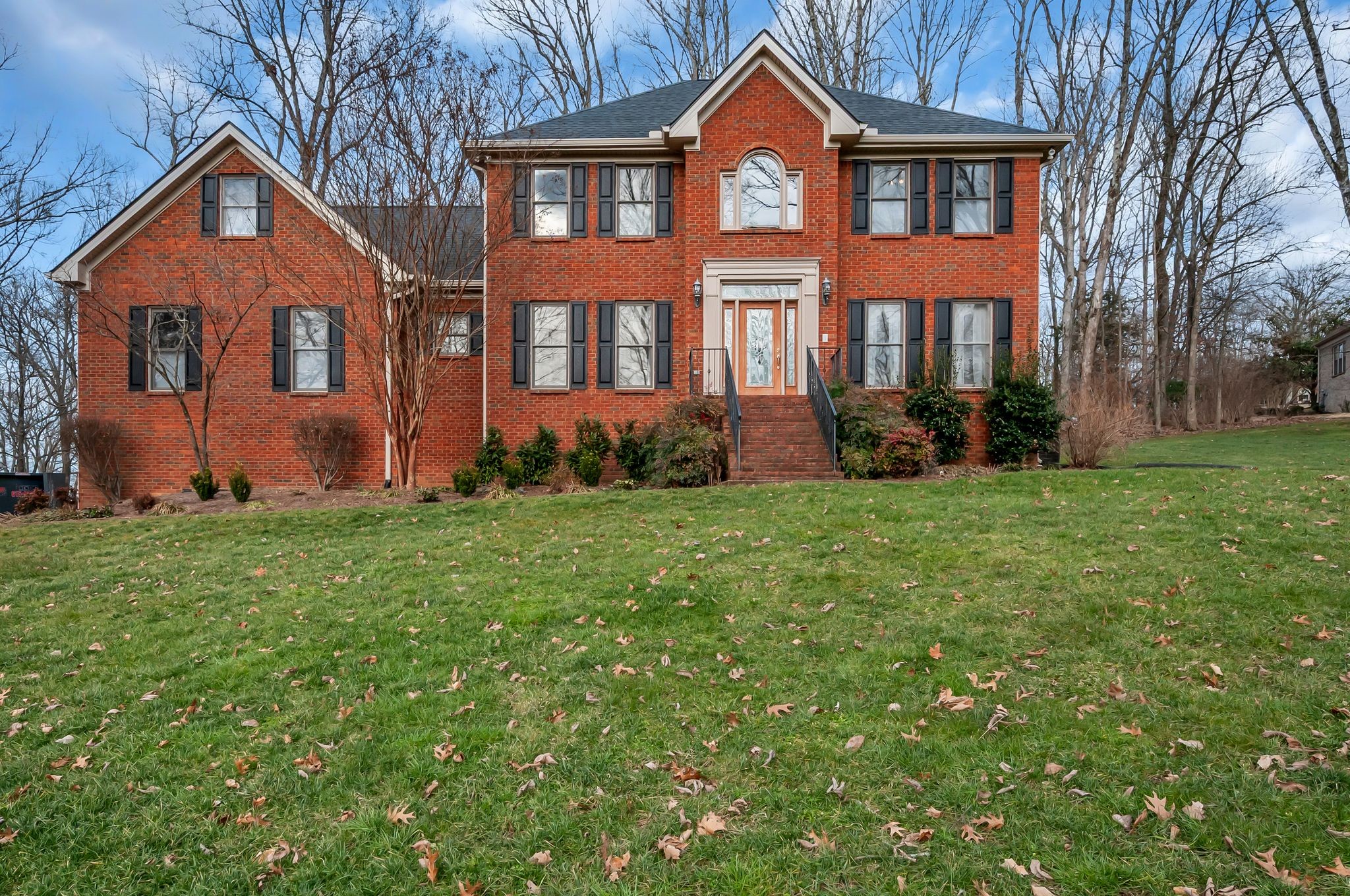 608 Cheshire Circle Franklin, TN 37069 - Photo 3 of 42 a front view of a house with a yard