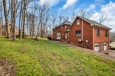 a front view of house with yard