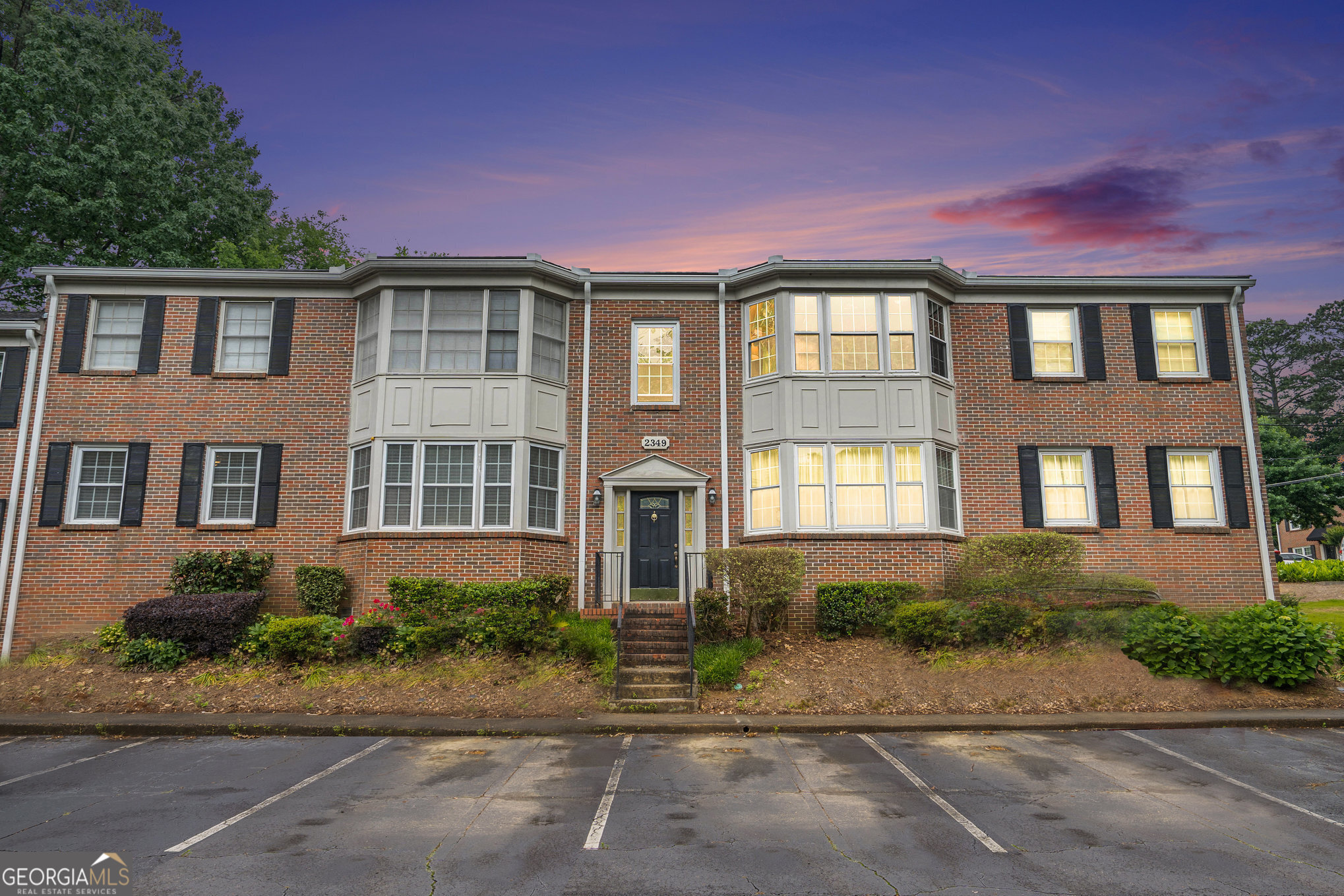 2349 Henderson Mill Road Atlanta, GA 30345 - Photo 1 of 1 a front view of a house with a yard