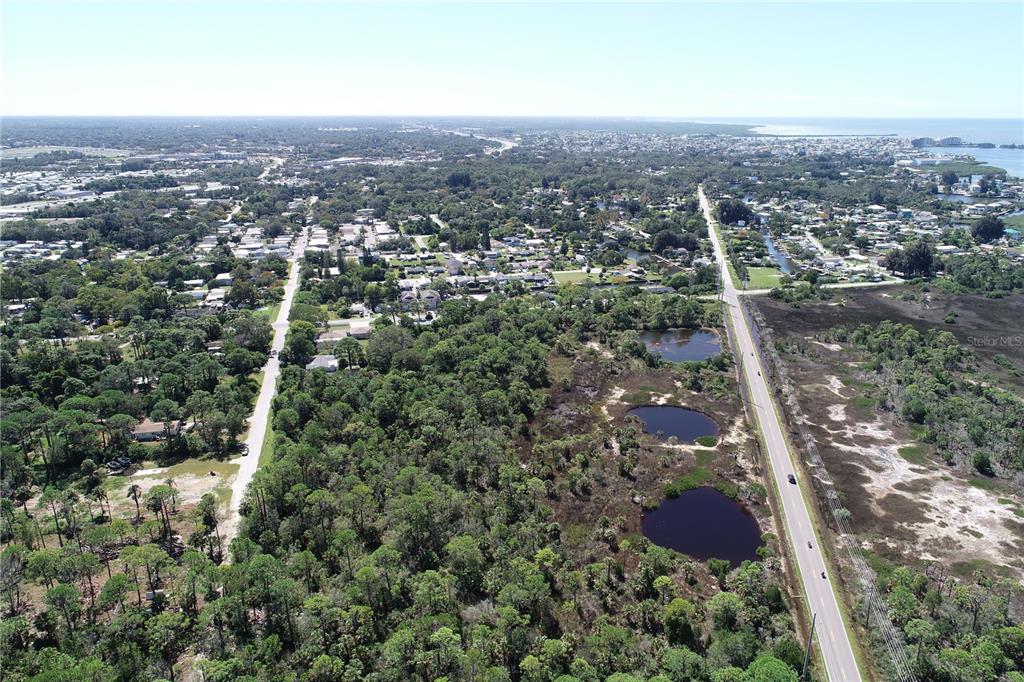 0 Shark Street, Unit LOT 4 Hudson, FL 34667 - Photo 4 of 14 an aerial view of residential house and outdoor space