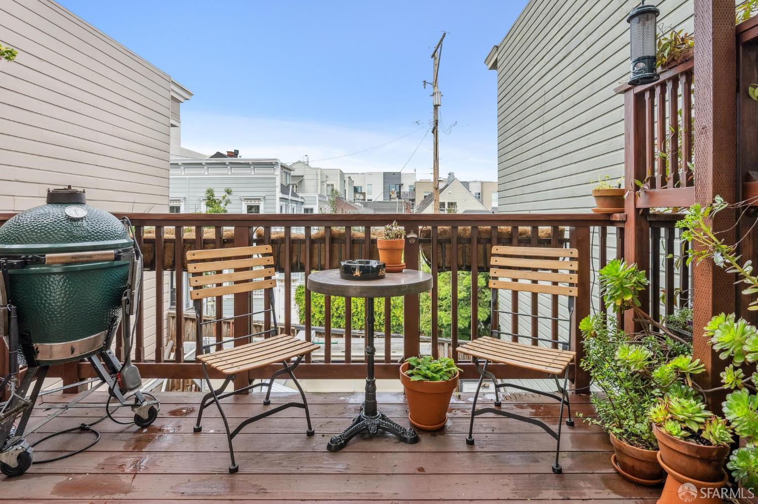 276 Page Street San Francisco, CA 94102 - Photo 20 of 25 a view of a chairs and table on the deck