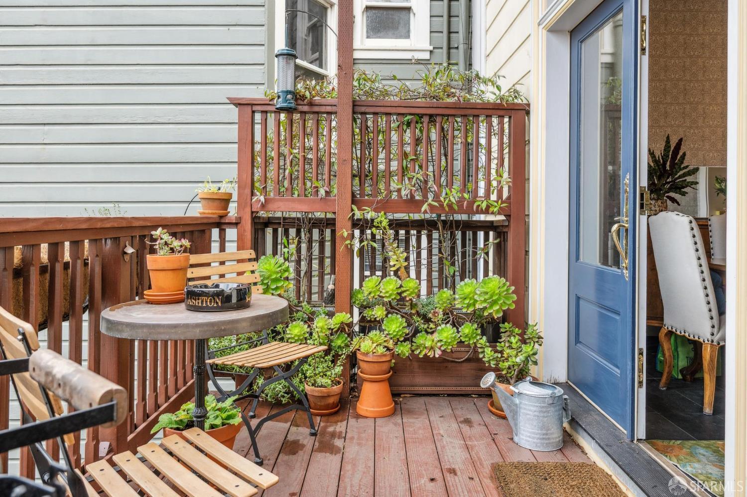 276 Page Street San Francisco, CA 94102 - Photo 21 of 25 a view of a chairs and table in patio with potted plants