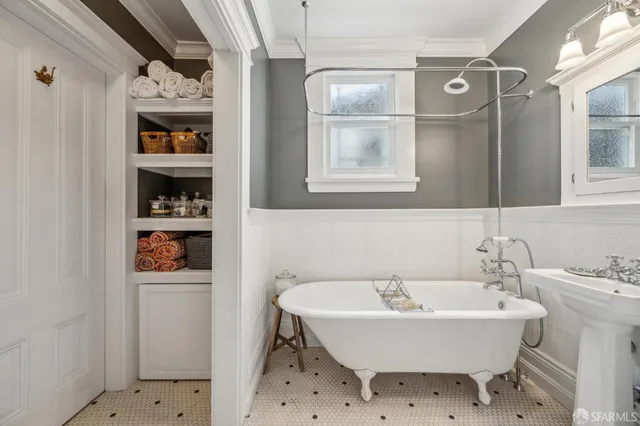 a bathroom with a sink and mirror