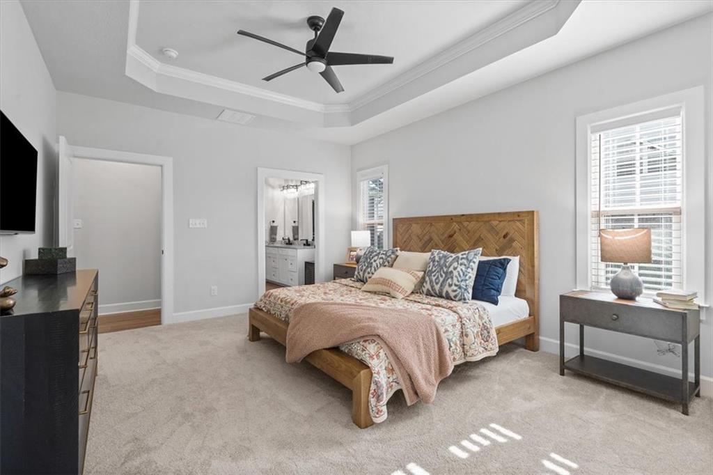 345 Crest Lane Mars, PA 16046 - Photo 21 of 42 a bedroom with a bed flat screen tv and a couch