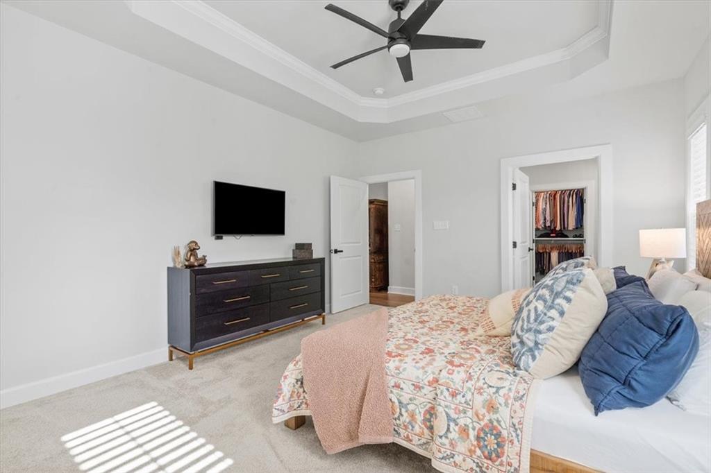 345 Crest Lane Mars, PA 16046 - Photo 22 of 42 a bedroom with a bed and a flat screen tv