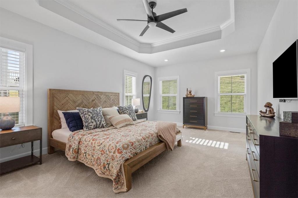 345 Crest Lane Mars, PA 16046 - Photo 23 of 42 a bedroom with a bed flat screen tv and a couch