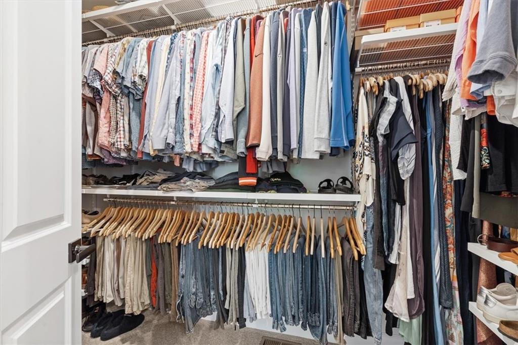 345 Crest Lane Mars, PA 16046 - Photo 27 of 42 a view of walk in closet with clothes and shoes