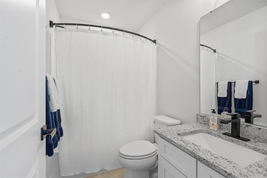 345 Crest Lane Mars, PA 16046 - Photo 33 of 42 a bathroom with a granite countertop sink toilet and shower