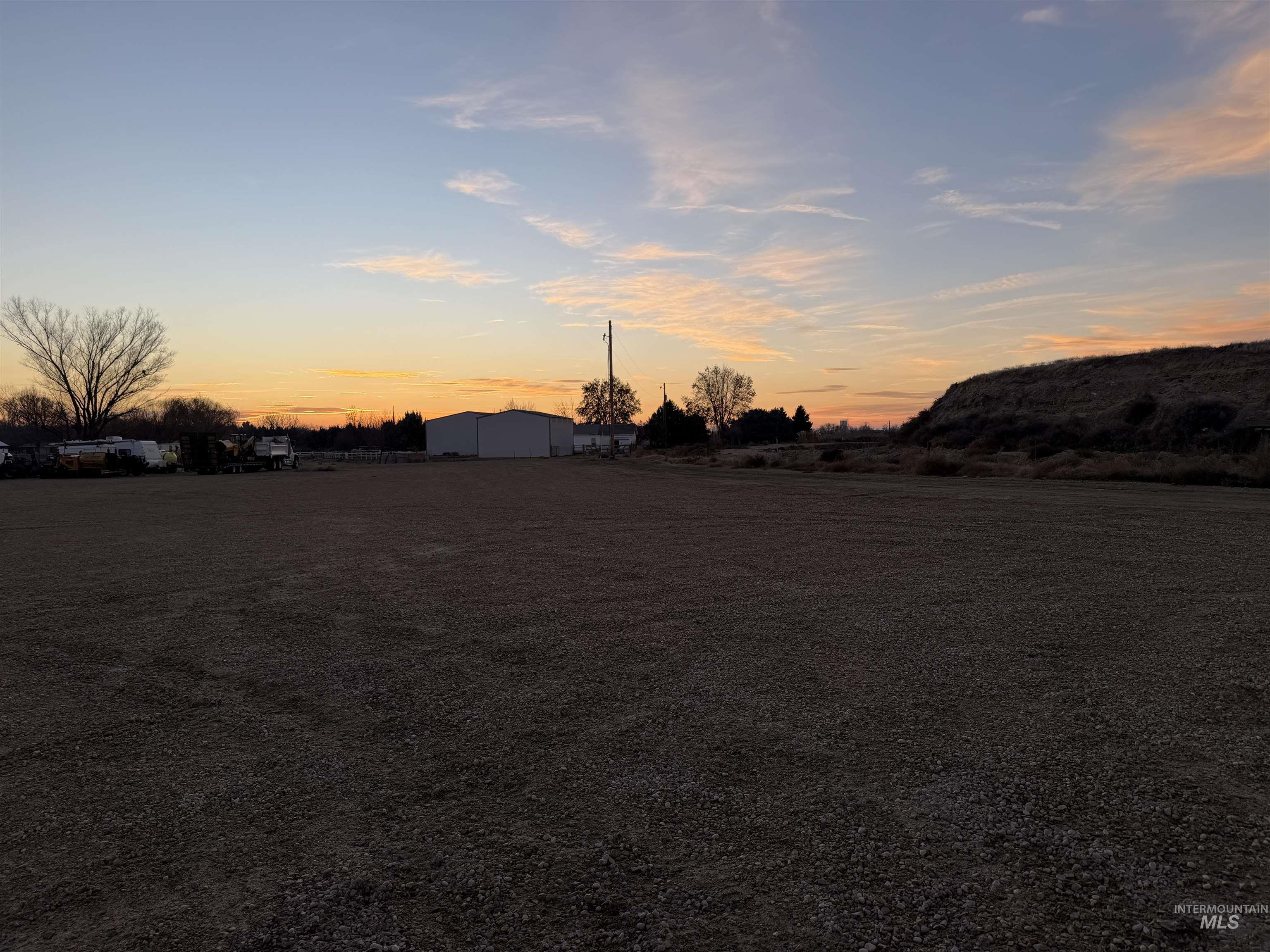 21677 Chicago Street Caldwell, ID 83607 - Photo 10 of 16 View of yard at dusk