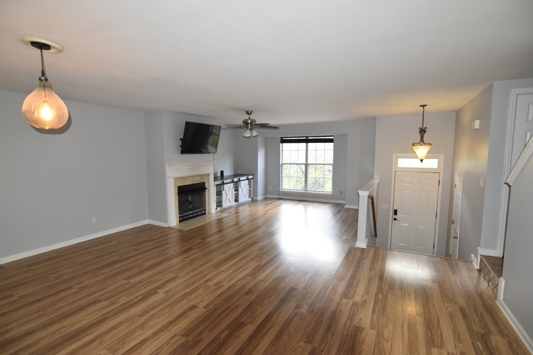515 Huntington Ridge Drive Nashville, TN 37211 - Photo 11 of 42 an empty room with wooden floor and windows