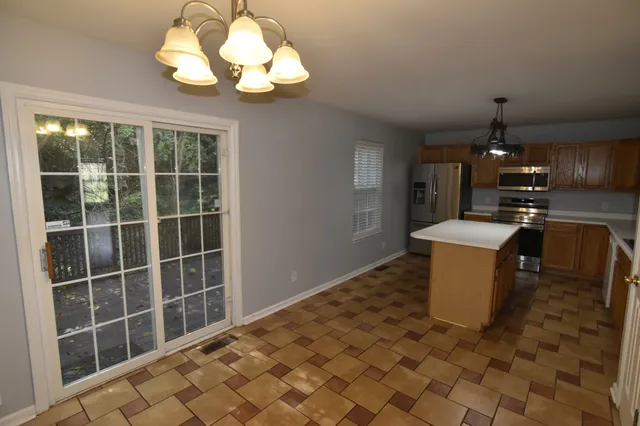 a view of a kitchen with a sink