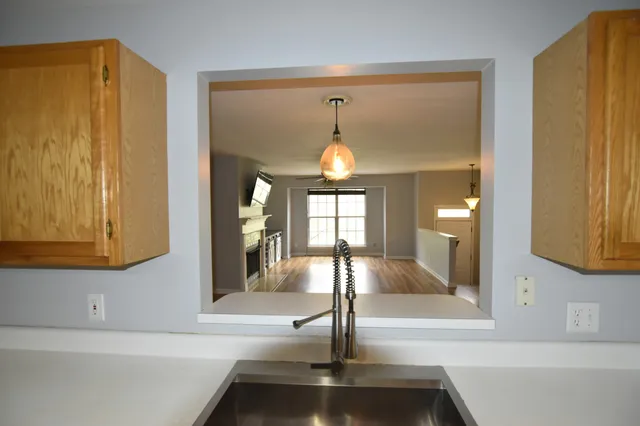 a view of a living room with entryway