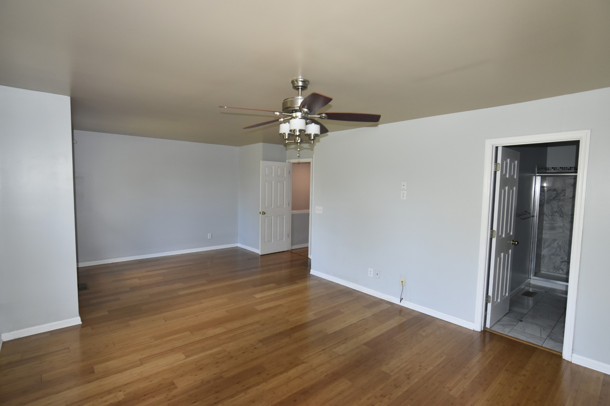 515 Huntington Ridge Drive Nashville, TN 37211 - Photo 23 of 42 a view of an empty room with wooden floor