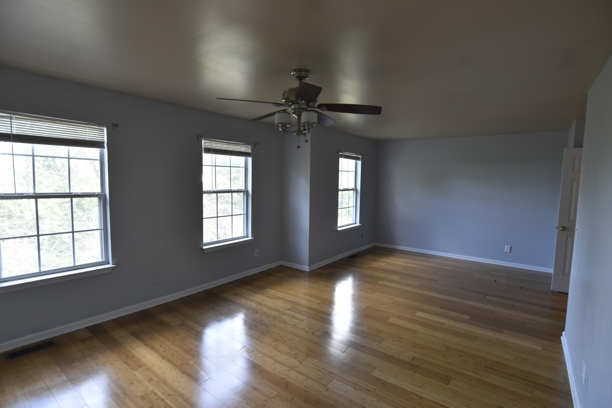 515 Huntington Ridge Drive Nashville, TN 37211 - Photo 24 of 42 a view of an empty room with wooden floor and a window