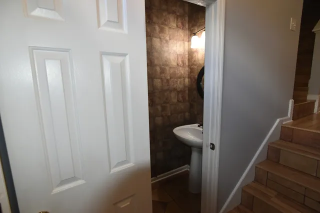 a bathroom with a mirror